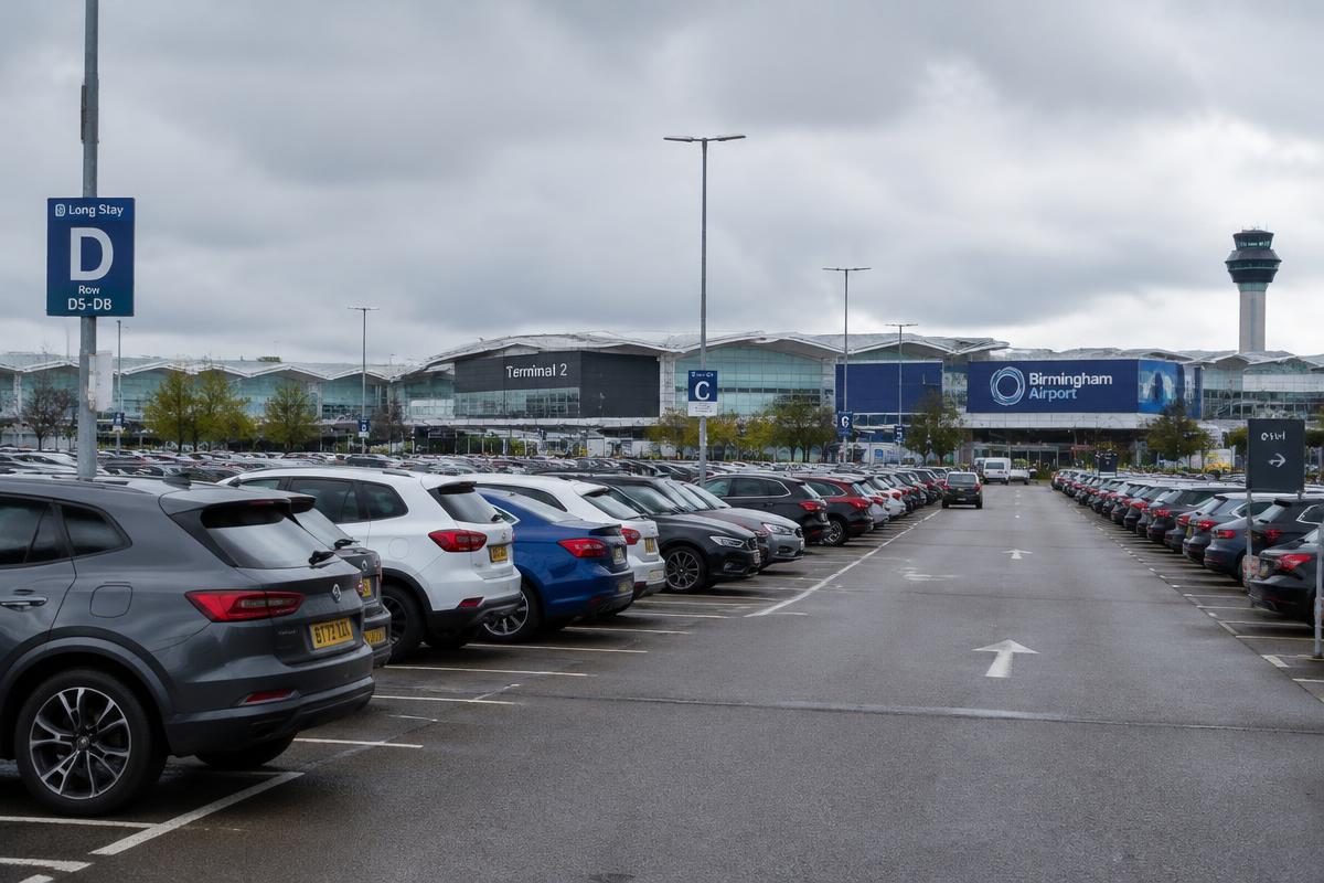 Rows of cars in an airport long stay car park